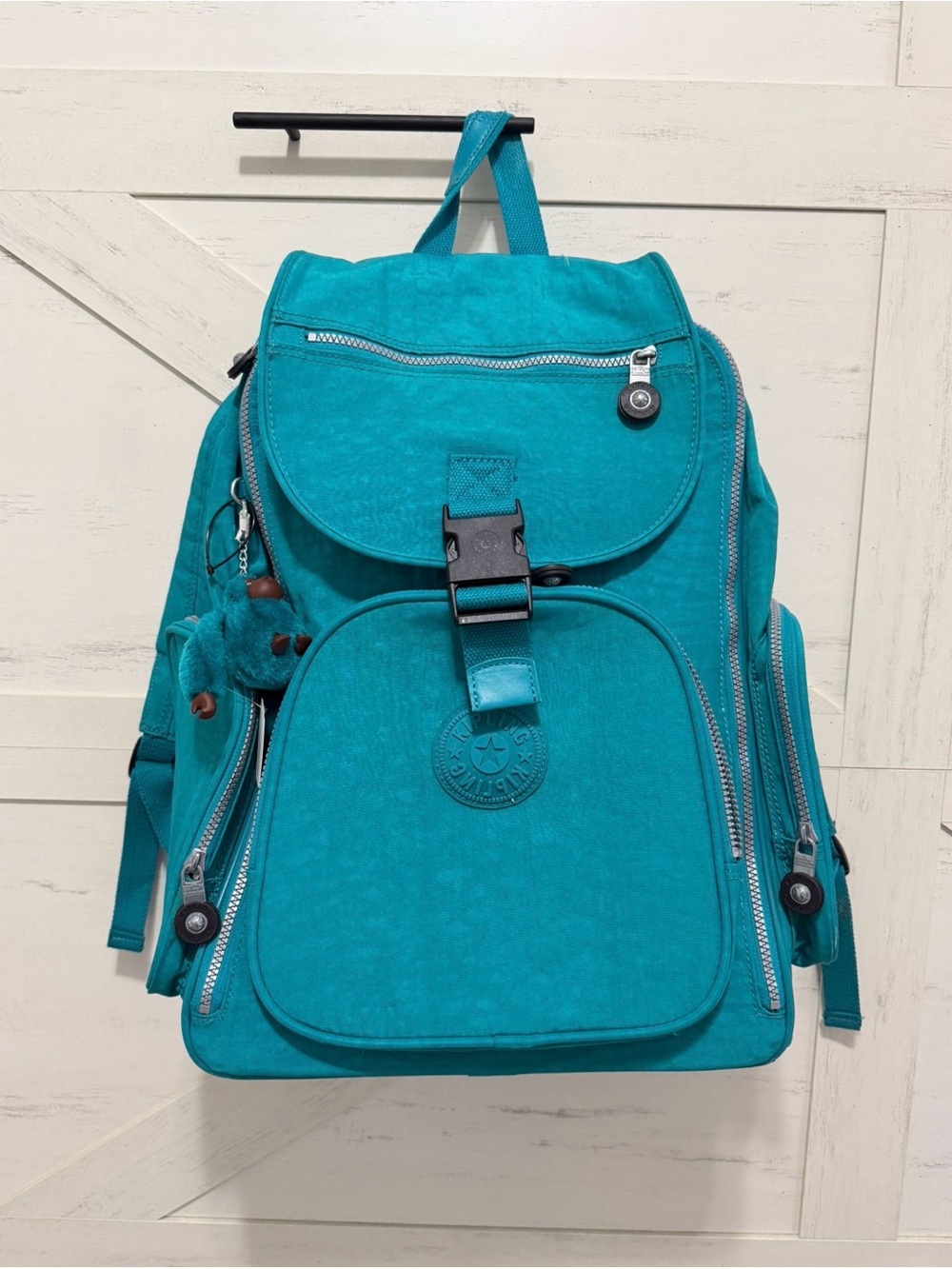 Kipling Teal Backpack Carry one with wheels